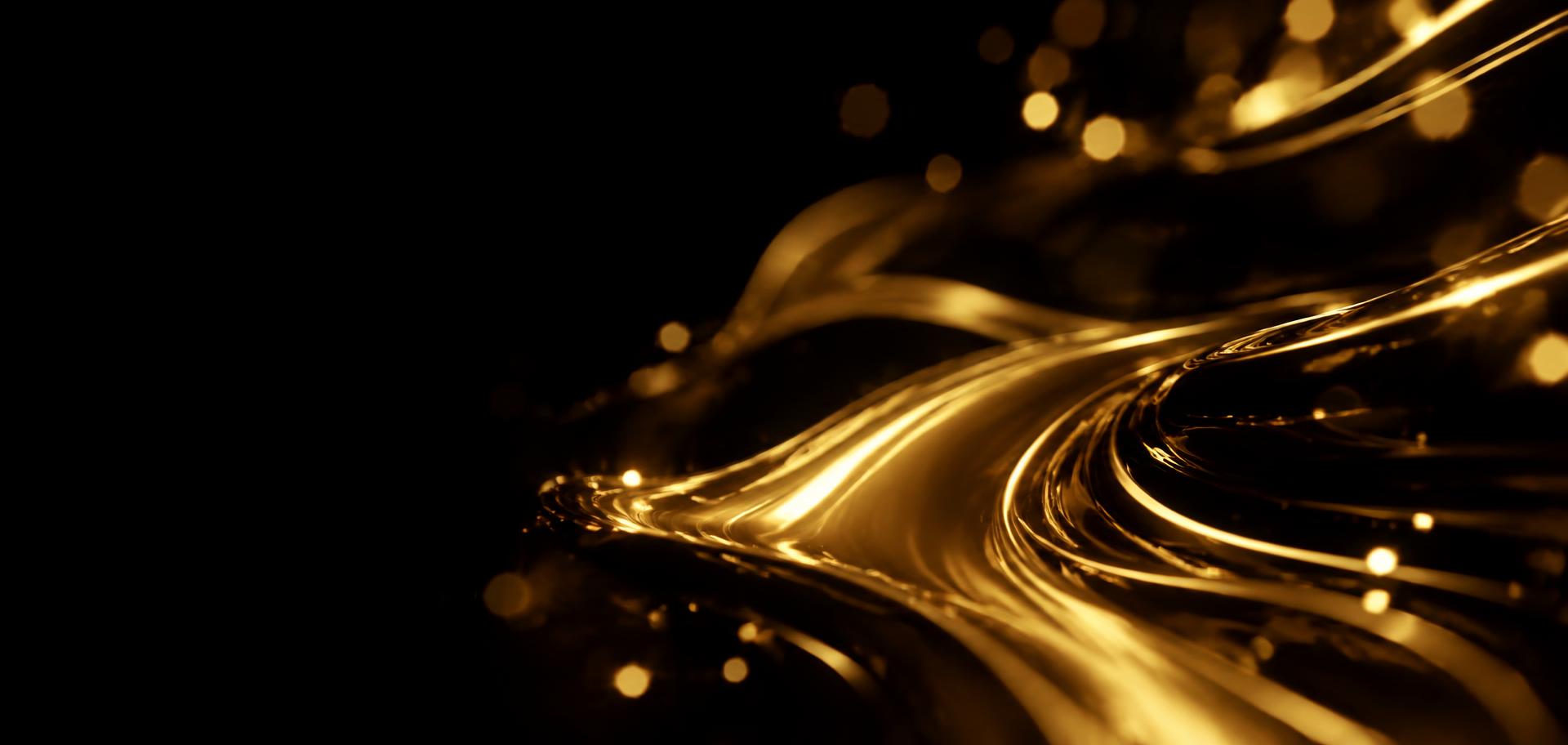 Flowing liquid gold ripples on a black background